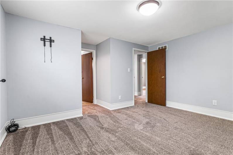 All bedrooms feature NEW carpeting.