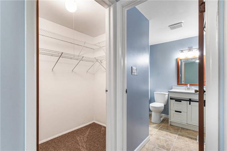 En-suite bath and walk-in closet.