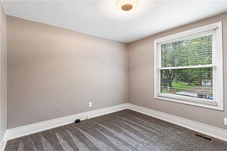 3rd bedroom featuring NEW carpeting.