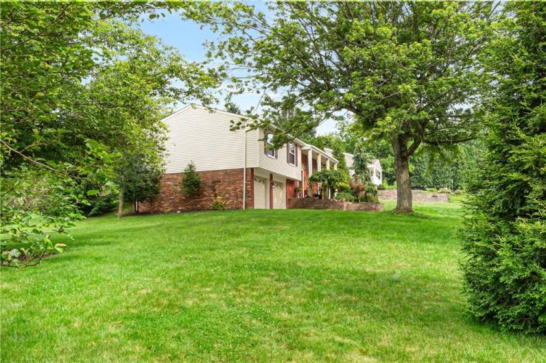 Large side yard on the left of the home. .75 Acres!