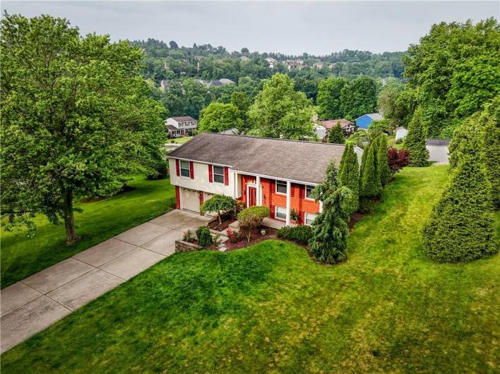 Lots of green space surrounding the home.