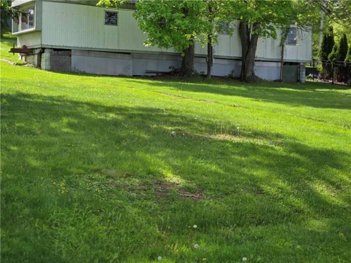 Trailer located at the rear of the property