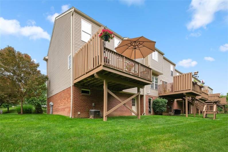Let the kids or dog play in this large level yard.   Or get together with friends for a friendly corn hole tournament.
