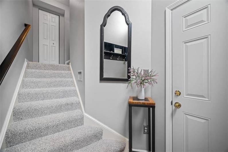 Step inside and you will find newer plush carpet that is found on 2 levels of the home.