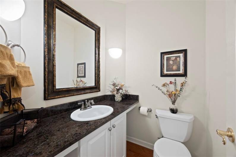 Conveniently located main-level powder room, perfect for guests