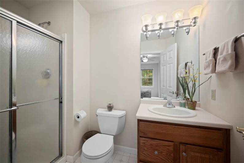 A private en suite bath completes the elegant 4th bedroom, offering comfort and convenience