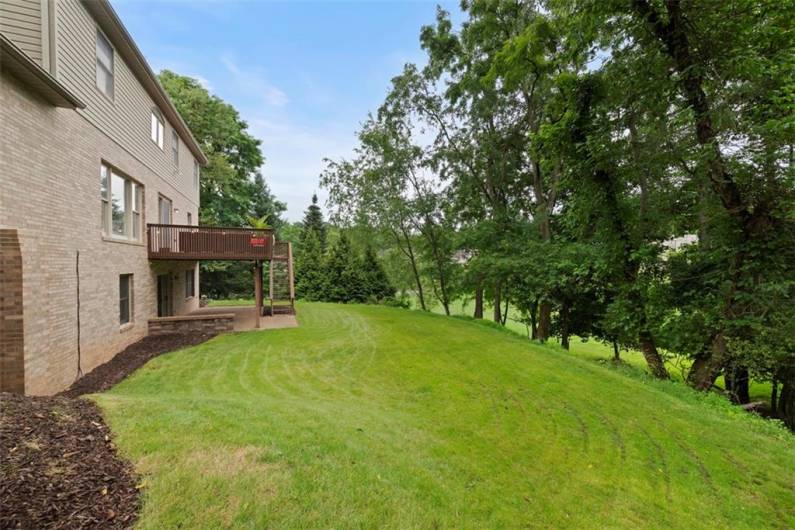 A beautifully landscaped backyard sanctuary, offering a harmonious escape filled with grace and serenity