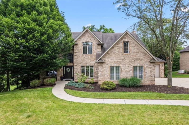 Brick Magnificence with Unmatched Curb Appeal