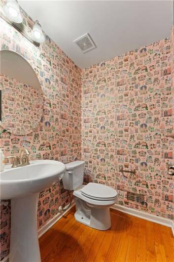 Half bath has stylish finishes.