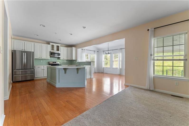 From family room into kitchen and through to morning room. New light fixture in morning room.