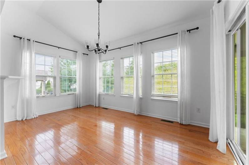 Morning room with lots of windows and new fixture.