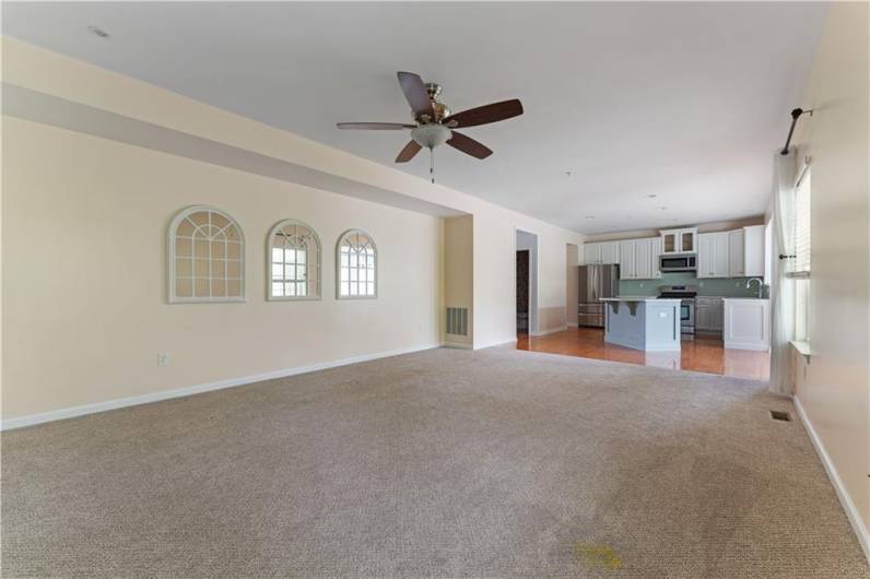Open concept with family, dining, kitchen.