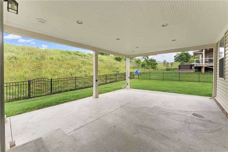 Relax on your covered patio with retractable shades.