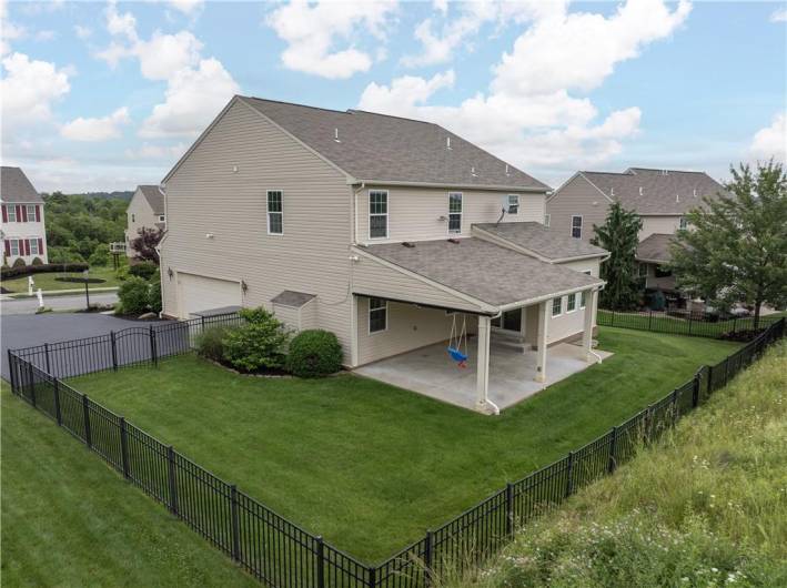 Flat fenced in yard with