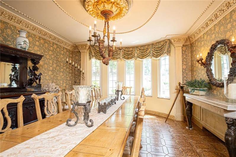 Subtle silk wallpaper line the walls to give a soft and homey feel perfect for family gatherings.