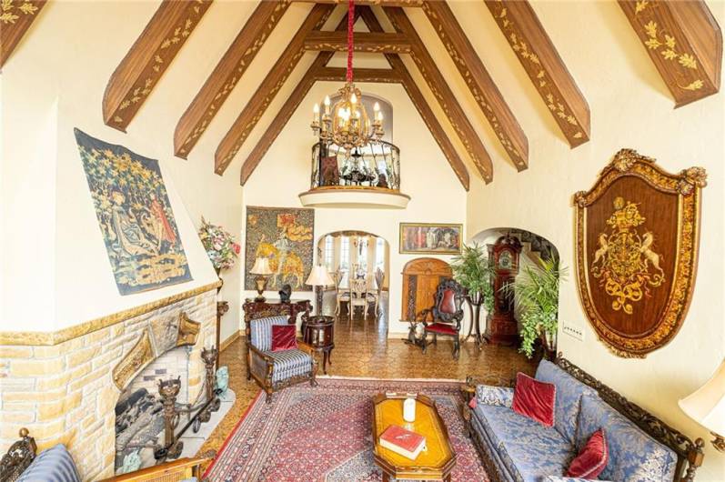 If that is not enough, the balcony from the second level sitting room overlooks this beautiful space. Don't miss the built in antique cabinet at far end of the room.