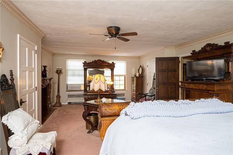 A his and hers closet are also a part of this beautiful bedroom.