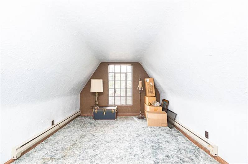This bedroom is on the 3 floor of the home. Ready for a new owner to make it their own.