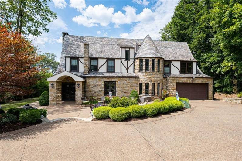 The back of the home is as beautiful as the front. I wonder if I can see a princess at the top of the stone turret.
