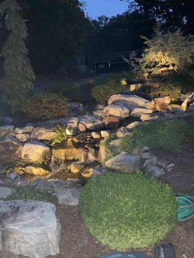 Check out the gorgeous waterfall at night.