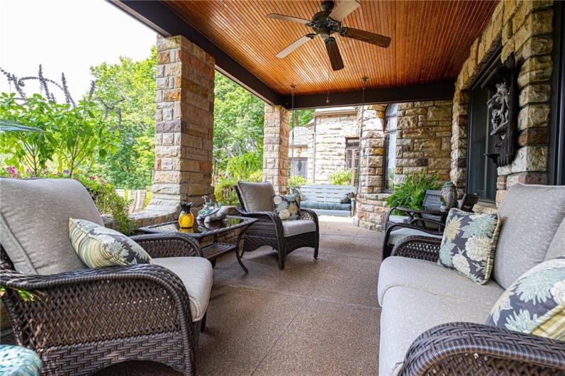 Cozy front covered patio great for morning coffee.