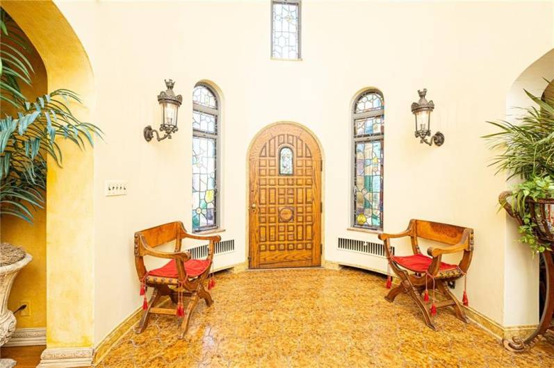 Feel the history and charm immediately in the front entry. Front door was installed in 1931 but was hand crafted in 1872.