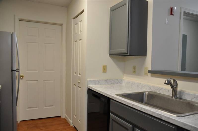 The laundry is on the other side of the door.