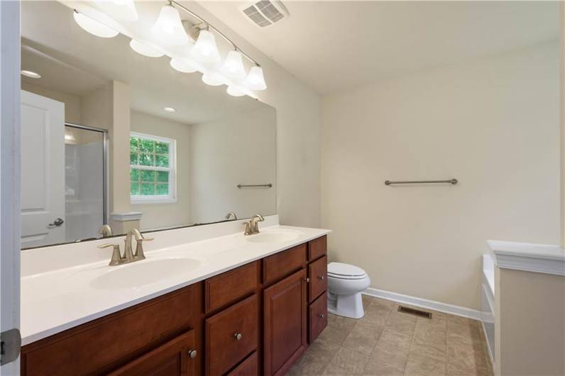 Full ensuite bath connected to the bedroom. Dual vanities!