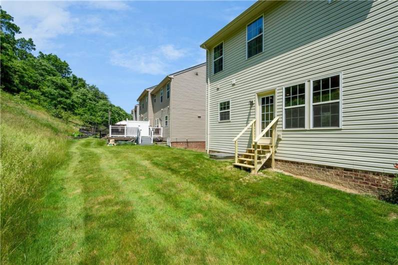 Rear yard provides room for activities and also privacy in the back!