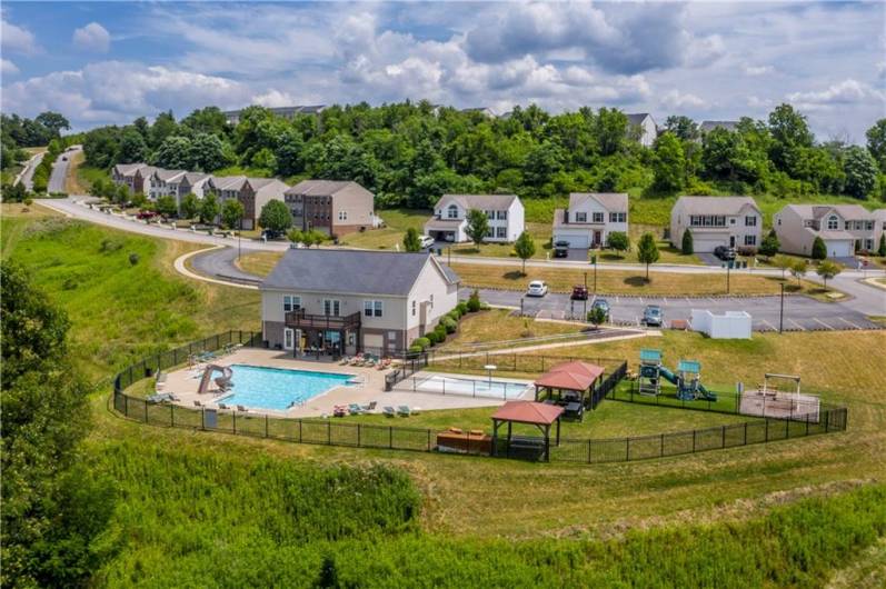 Community area equipped with pool, clubhouse, kids play area, and more!