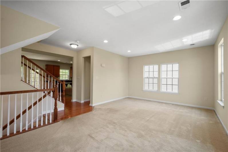 Main level family room! Enjoy plenty of natural light and canned lighting!