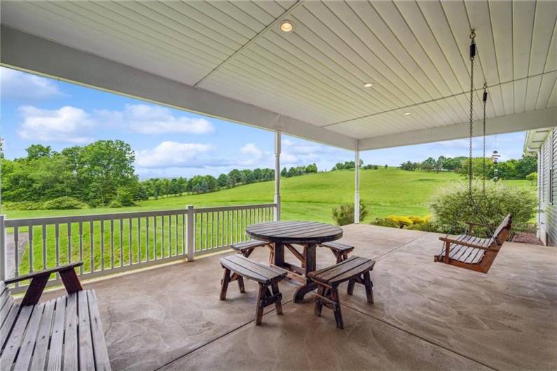 Covered back patio with sweeping views