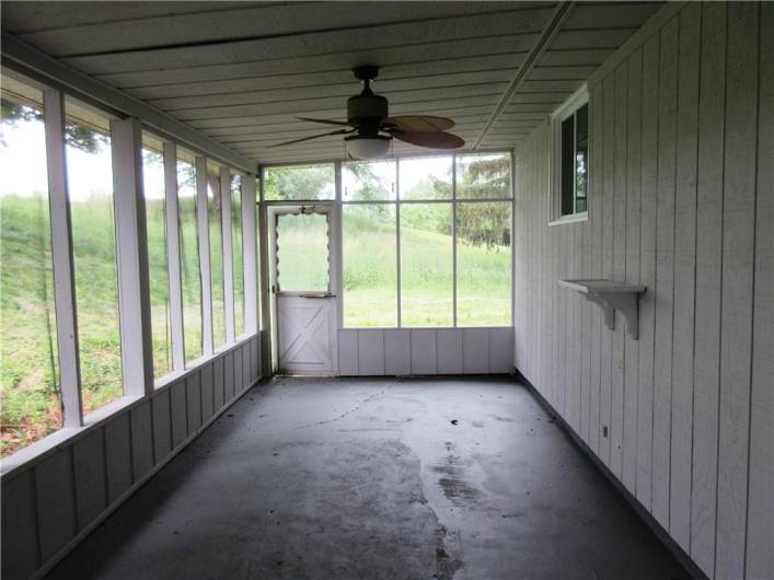 Enclosed Porch at rear of the house.