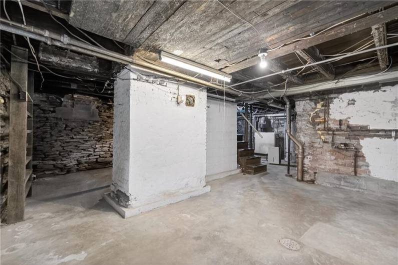 The basement has plenty of storage space and you can walk right outside to your yard!