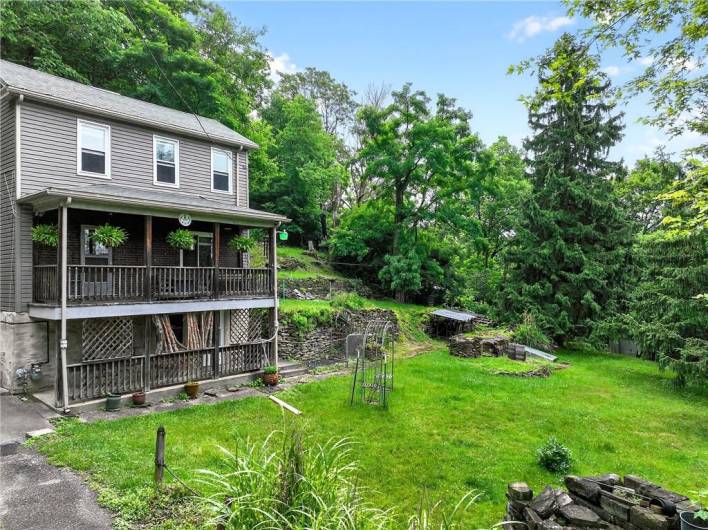 This home is an urban oasis!  So much green and privacy!