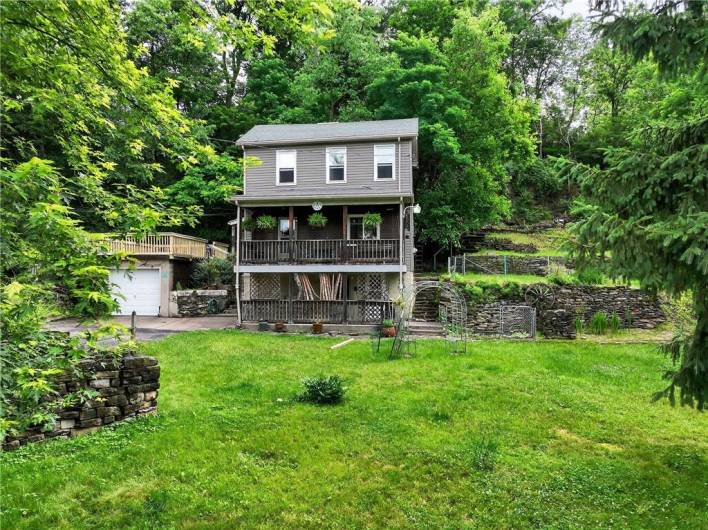 This home is an urban oasis!  So much green and privacy!