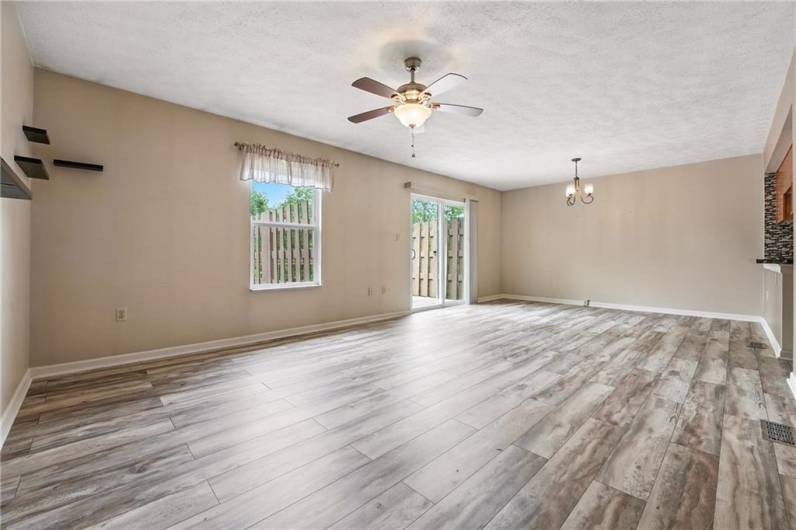 Living room/Dining room combo. With access to upper-level deck.