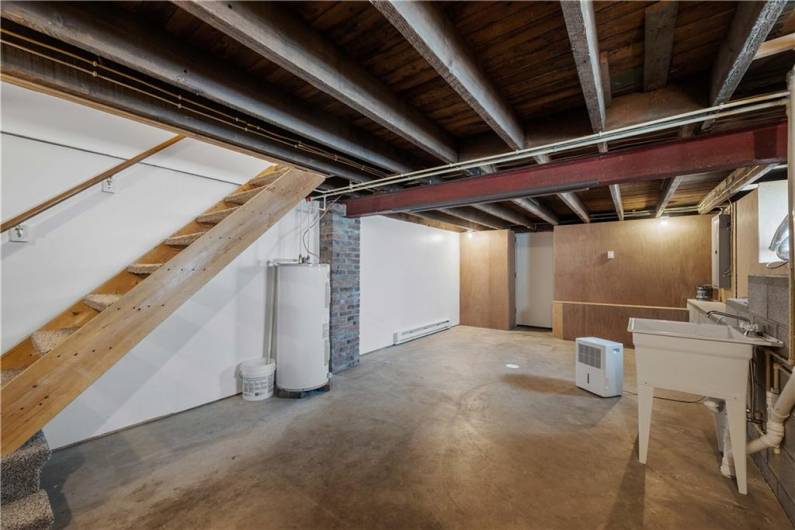 Nicely redone with French drains and sump pump.  Exposed brick adds a nice touch.