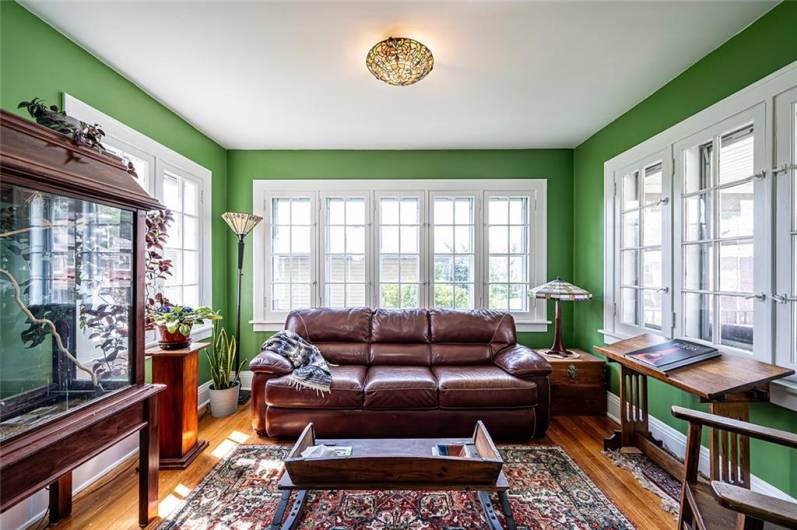 SUNROOM W/ EAST, SOUTH & WEST VIEWS.
