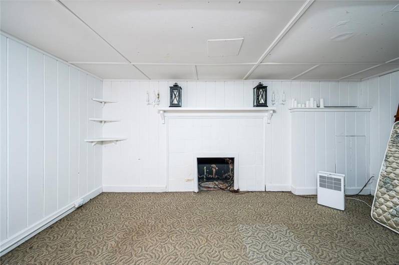 FAMILY ROOM - LOWER LEVEL W/ DECORATIVE FIREPLACE