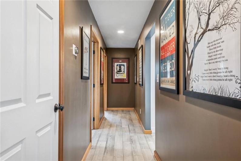 Hallway to guest bath, garage, laundry