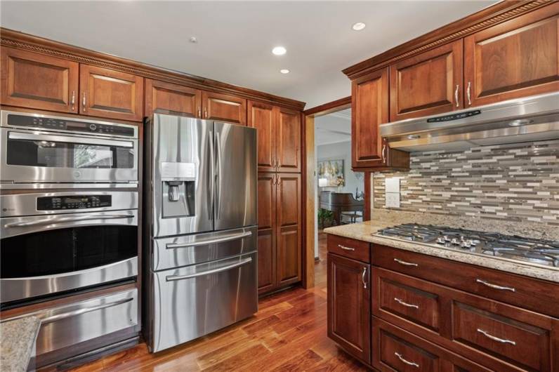 GE Profile microwave is also a convection oven. Warming drawer at bottom