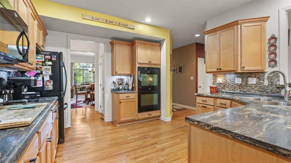 Kitchen view of pantry and desk area