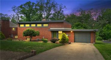 This mid-century modern-style home in the Cedarhurst Manor neighborhood is a rare find.