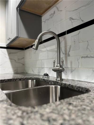 Double sided kitchen sink
