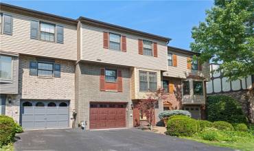 Newer garage door at 7376 Beacon Hill Drive.