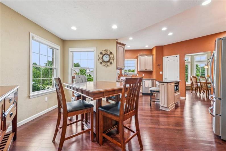 How about breakfast in this area of the home.  Hardwood flooring, beautiful trim work with lots of can lighting.