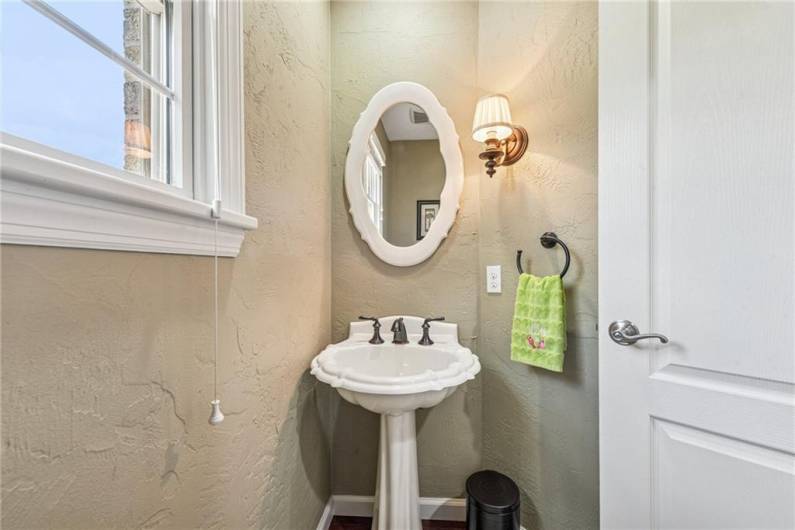 This powder room is conveniently placed just off the breakfast area before the first floor laundry room.