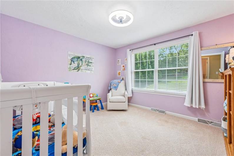 Already the perfect nursery overlooking the backyard and pool area with yet another walk in closet!