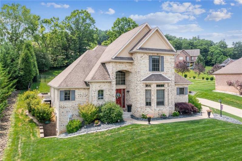 Striking multiple-rooflines add architectural interest and curb appeal, creating a dynamic silhouette that sets this home apart!